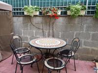 A balcony or terrace at Brand New Garden Flat / Free Parking