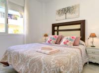 Posteľ alebo postele v izbe v ubytovaní APARTAMENTO VIÑUELA