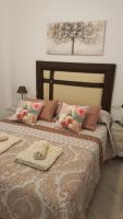 Posteľ alebo postele v izbe v ubytovaní APARTAMENTO VIÑUELA