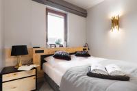 Posteľ alebo postele v izbe v ubytovaní Antałówka Apartments Zakopane