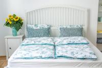 A bed or beds in a room at Harrison(e)