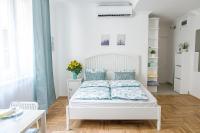 A bed or beds in a room at Harrison(e)