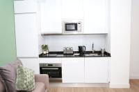 A kitchen or kitchenette at New Point Opera