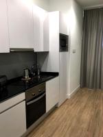 A kitchen or kitchenette at New Point Opera