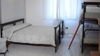 Posteľ alebo postele v izbe v ubytovaní Residence Praetorium Maiella Park