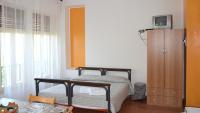 Posteľ alebo postele v izbe v ubytovaní Residence Praetorium Maiella Park