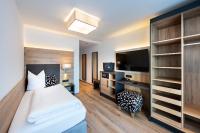Posteľ alebo postele v izbe v ubytovaní Hotel Modern Mountain