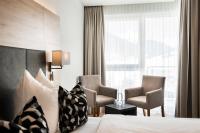 Posteľ alebo postele v izbe v ubytovaní Hotel Modern Mountain