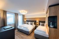 Posteľ alebo postele v izbe v ubytovaní Hotel Modern Mountain