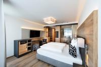 Posteľ alebo postele v izbe v ubytovaní Hotel Modern Mountain