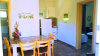 Kuchyň nebo kuchyňský kout v ubytování Cristi Apartments