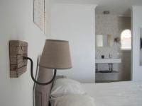 Postel nebo postele na pokoji v ubytování Frontline villa, five star deluxe