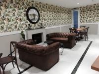 A seating area at New Point Opera
