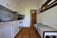 A kitchen or kitchenette at Villa Orrì