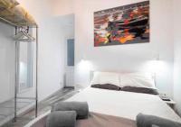 A bed or beds in a room at San Sebastián VERY NICE apartment 100m from La Kontxa Beach
