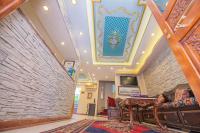 TV a/nebo společenská místnost v ubytování Kaftan Hotel
