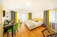 Postel nebo postele na pokoji v ubytování Bellevue Hotel Benešov