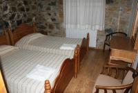Postel nebo postele na pokoji v ubytování ATRATSA Mountain Suites