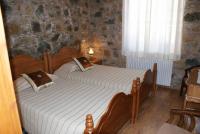 Postel nebo postele na pokoji v ubytování ATRATSA Mountain Suites