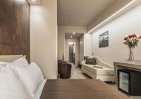 A seating area at Astoria Deluxe rooms