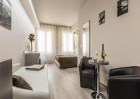 A seating area at Astoria Deluxe rooms