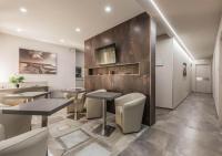 A kitchen or kitchenette at Astoria Deluxe rooms