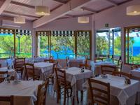 Reštaurácia alebo iné gastronomické zariadenie v ubytovaní Hotel Paradiso