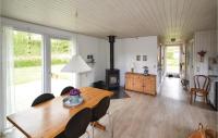 Posezení v ubytování Holiday Home Bogfinkevej Ørsted Xi