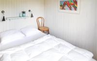 Postel nebo postele na pokoji v ubytování Holiday Home Bogfinkevej Ørsted Xi