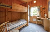 Postel nebo postele na pokoji v ubytování Holiday Home Leopardvej Tarm X