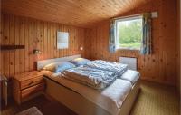 Postel nebo postele na pokoji v ubytování Holiday Home Leopardvej Tarm X