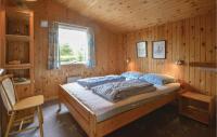 Postel nebo postele na pokoji v ubytování Holiday Home Leopardvej Tarm X