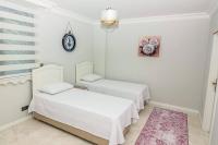 Postel nebo postele na pokoji v ubytování Bahar Villas Sapanca