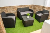 Posezení v ubytování APARTAMENT SARDINA NEAR THE BEACH WITH POOL AND WIFI e