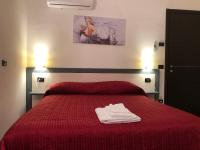 Posteľ alebo postele v izbe v ubytovaní La Casa di Anna