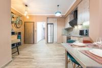 A kitchen or kitchenette at Stylish Luxury Apartment near Acropolis at Neos Kosmos metro station