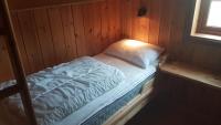 Postel nebo postele na pokoji v ubytování Solbjørnlia Apartments