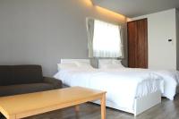 Gate Inn Nagoにあるベッド
