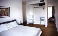 A bed or beds in a room at Mxp Rooms Guest House