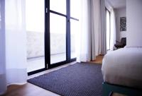 A bed or beds in a room at Mxp Rooms Guest House