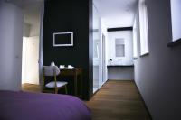 A bed or beds in a room at Mxp Rooms Guest House