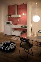 A kitchen or kitchenette at Mxp Rooms Guest House