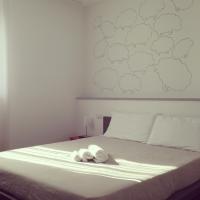 A bed or beds in a room at Mxp Rooms Guest House