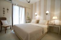 Posteľ alebo postele v izbe v ubytovaní Kores Villas