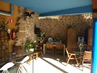 Televízia a/alebo spoločenská miestnosť v ubytovaní Hotel Rural Las Águedas