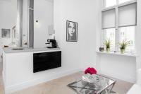 Telewizja i/lub zestaw kina domowego w obiekcie Apartments Warsaw City Center by Noclegi Renters
