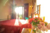 A bed or beds in a room at La Sorgente