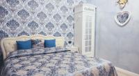 A bed or beds in a room at L'Antenna