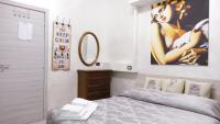 A bed or beds in a room at L'Antenna