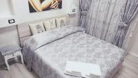 A bed or beds in a room at L'Antenna
